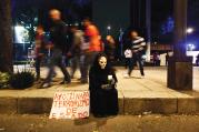 NOCHE DE LOS MUERTOS. Demonstrators demanded justice for 43 missing students in Mexico City on Nov. 8. The sign reads “Ayotzinapa, state terrorism” 