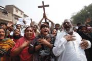 PERSECUTED COMMUNITY. Pakistani Christians at a protest rally in 2013 to condemn a suicide attack on All Saints Church in Peshawar.