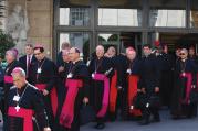 SYNODAL STROLL. Cardinals and bishops leave the Oct. 9 morning session at the Vatican.