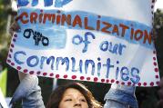 DETENTION PROTEST. An immigration advocate demonstrates in Los Angeles on July 10. 