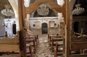 Debris seen inside damaged church in Syria. (CNS photo/Khaled al-Ha riri, Reuters) 
