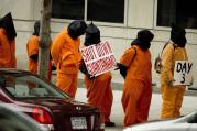 Protesters against the Guantanamo Bay prison line up outside the transition office of U.S. President-elect Barack Obama in 2009.