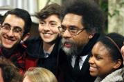 Dr. Cornel West poses with students after his talk at Maryhouse Catholic Worker on Nov. 8, 2013. Photo courtesy of Palina Prasasouk.