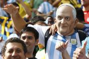 An Argentina fan wears a mask of Pope Francis as he attends the 2014 World Cup Group F final June 25, 2014, between Argentina and Nigeria at the Beira Rio stadium in Porto Alegre, Brazil. (CNS photo/Stefano Rellandini, Reuters) 