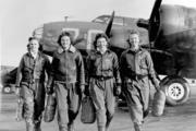 Four female pilots, part of the WWII-era Women Airforce Service Pilots program (WASP), in front of a B-17 Flying Fortress. (US Air Force photo) 