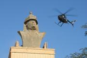 Blackwater Little Bird over Republican Palace, Baghdad (Photo via Wikimedia Commons)