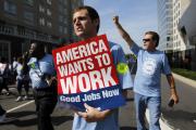 Chris Martin, center, marches with Local 5285 in a Labor Day parade ahead of the 2012 Democratic National Convention. (CNS photo/Jessica Rinaldi, Reuters)