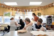 Second-grade students at St. Joseph School in Penfield, N.Y. make pies for a local soup kitchen (CNS photo/Mike Crupi, Catholic Courier)