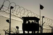 U.S. Army troops stand guard over Sally Port One at Camp Delta in 2006 where detainees are held at the U.S. Naval Base in Guantanamo Bay, Cuba. (CNS photo/Joe Skipper, Reuters)