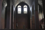 A Free Syrian Army fighter walks inside a church in Aleppo, Syria, Nov. 4. (CNS photo/Molhem Barakat, Reuters)