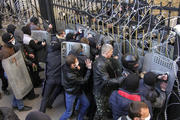 Pro-Russia protesters scuffle with the police at the regional government building in Donetsk.
