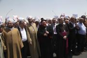 Demonstrators from various religions gather during protest in Iraq against militants of Islamic State. (CNS photo/Azad Lashkari, Reuters)