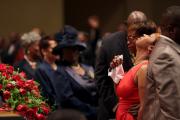 Michael Brown's mother is comforted during his funeral in St. Louis. (CNS photo/Robert Cohen, pool via EPA)