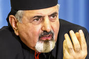 Syriac Catholic Patriarch Ignace Joseph III Younan gestures during a press conference on the human rights situation of Christians in Iraq and Syria at the European headquarters of the United Nations in Geneva Sept. 16. (CNS photo/Salvatore di Nolfi, EPA)