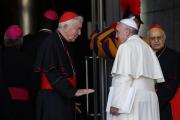 Cardinal Vincent Nichols of Westminster, England, talks with Pope Francis as the arrive for the concluding session of the extraordinary Synod of Bishops on the family at the Vatican Oct. 18. At right is Cardinal Lorenzo Baldisseri, general secretary of the Synod of Bishops. (CNS photo/Paul Haring) 