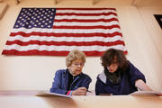 Beverly Moore helps her grandson Johnah Karman-Moore vote for the first time at Bellarmine University in Louisville, Ky., Nov. 4, during the midterm elections. (CNS photo/Mark Lyons, EPA)