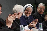 Sister Sharon Holland, president of the Leadership Conference of Women Religious, receives applause at Vatican press conference for release of final report of Vatican-ordered investigation of U.S. communities of women religious.