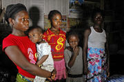 Liberian children are seen in home after death of both of their parents due to Ebola virus.