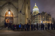 Students wait in line to pay respects at visitation for Holy Cross Father Theodore Hesburgh at University of Notre Dame