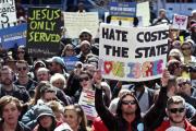 Demonstrators gather in Indianapolis to protest new religious freedom law.