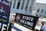 Protesters against the death penalty gather in front of the U.S. Supreme Court building in Washington June 29. (CNS photo/Jonathan Ernst, Reuters) 