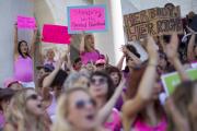 Women rally in support of Planned Parenthood on "National Pink Out Day" on the steps of City Hall in Los Angeles Sept. 29. A House measure would give states the authority to defund Planned Parenthood. (CNS photo/Mario Anzuoni, Reuters)
