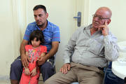 A Christian family who fled violence in Mosul, Iraq. (CNS photo/Jamal Nasrallah, EPA)