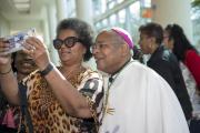 Retired Bishop Gordon D. Bennett of Mandeville, Jamaica, poses for a photo with an attendees of the 12th National Black Catholic Congress on July 9 in Orlando. (CNS/courtesy Nancy Jo Davis, National Black Catholic Congress)