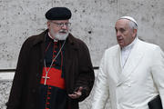 Pope Francis talks with Cardinal Sean P. O'Malley of Boston, president of the Pontifical Commission for the Protection of Minors, as they arrive for a meeting in the synod hall at the Vatican in this Feb. 13, 2015, file photo. (CNS photo/Paul Haring) 