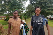 Refugees from Cameroon in the Nigerian village of Agbokim with clothes donated by humanitarian organizations. (Shola Lawal)