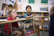 Second-grader Yoselyn Arroyo answers a question in class at Holy Name of Jesus Catholic School in Henderson, Ky. (CNS photo/Tyler Orsburn) 