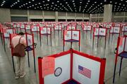 A voter in Louisville, Ky., completes his ballot for his state’s primary election, held on June 23. (CNS photo/Bryan Woolston, Reuters)