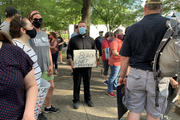 Father Joshua Laws, pastor of the Catholic Community of South Baltimore, participates in an interfaith prayer vigil against racism on June 3 in Baltimore. (CNS photo/Tim Swift, Catholic Review)