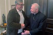 Kevin Bourgeois with Archbishop Gregory Aymond (CNS photo/courtesy Archdiocese of New Orleans)