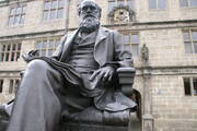A statue of Charles Darwin at his former school, which is now Shrewsbury Library in the United Kingdom (iStock)