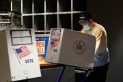 A voter in New York City fills out a ballot at Hudson Yards during early voting on Oct. 24, 2021. (CNS photo/Bryan R Smith, Reuters)