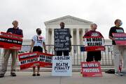 Protesters against the death penalty outside the U.S. Supreme Court building in Washington Oct. 13, 2021. (CNS photo/Jonathan Ernst, Reuters)