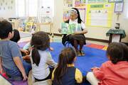 Sister Thereselle Arruda reads to preschoolers at St. Peter Indian Mission School in Bapchule, Ariz. The Franciscan Sisters of Christian Charity have served the Gila River Indian Community since 1935. (CNS photo/Nancy Wiechec)