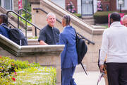 Brother Jim Boynton greets an incoming freshman at University of Detroit High School and Academy (photo: U. of D. Jesuit).