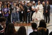 for an article on synodality, pope francis stands in front of a group of young people giving a speech