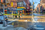 A water main break in January 2015 snarls streets in Lower Manhattan. iStock photo.