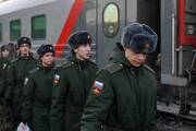 Russian recruits called up for military service walk along a platform before boarding a train in Omsk, Russia, on Nov. 27, 2022. (CNS photo/Alexey Malgavko, Reuters)