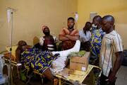 Relatives gather around one of the victims of the attack by gunmen during a Pentecost Mass at St. Francis Xavier Church in Owo, as she receives treatment at the Federal Medical Centre in Owo, Nigeria, June 6, 2022. Reports said at least 50 people were killed in the attack. (CNS photo/Temilade Adelaja, Reuters)