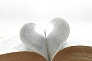 pages of a book formed into a heart shape