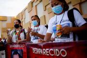 People with missing relatives and victims of violence walk in a procession in Ciudad Juarez, Mexico July 28, 2022, in memory of their loved ones as part of the Praying Days for Peace called by the Catholic Church due to the ongoing violence in Mexico. (CNS photo/Jose Luis Gonzalez, Reuters)