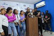 Liony Batista, holding microphone, is the founder of Fundación Nueva Alegría in the Dominican Republic. Photo courtesy of Cross Catholic Outreach.