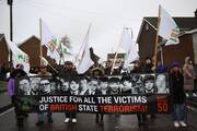 A memorial march marks the 50th anniversary of Bloody Sunday in Derry, Northern Ireland, on Jan. 30, 2022. Families of the 14 unarmed Catholics killed by the British military in 1972 are challenging the British government's resistance to prosecuting the soldiers in the courts. (CNS photo/Clodagh Kilcoyne, Reuters)