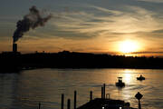 At left: the Marshall Steam Station coal power plant, near Mooresville, N.C. (AP Photo/Chris Carlson)