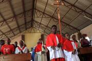 Altar servers lead a procession at the start of Mass in Marondera, Zimbabwe, Jan. 1, 2024. (OSV News photo/Philimon Bulawayo, Reuters)