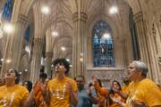 A group of Latino parishioners singing at Mass. Photo from the film "The Acolytes of the South Bronx," part of the series "Longing for More: Young Adult Hispanic Catholics." (Sabrina Avilés)